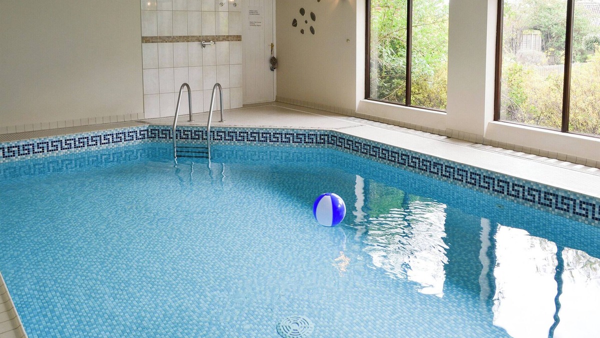Costessey Cottage | A dog friendly cottage for four with its own swimming pool and enclosed garden.