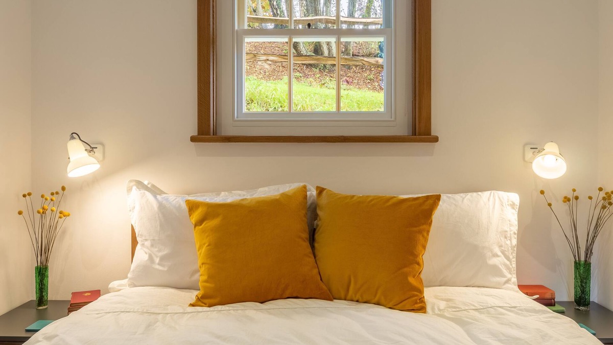 Robertsbridge Cottage | A light and airy property with a hammock and hot tub, situated on a working farm
