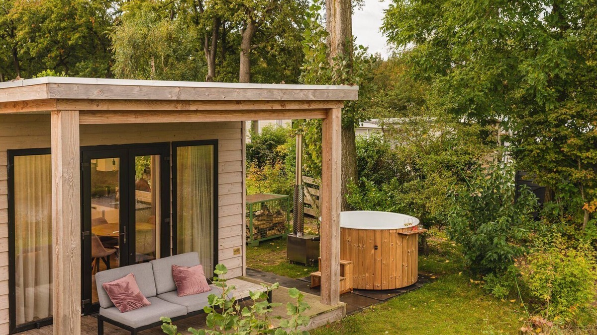 Zuna Cabin | A lodge with hot tub and views over the Regge River. A sales pitch is really not necessary.