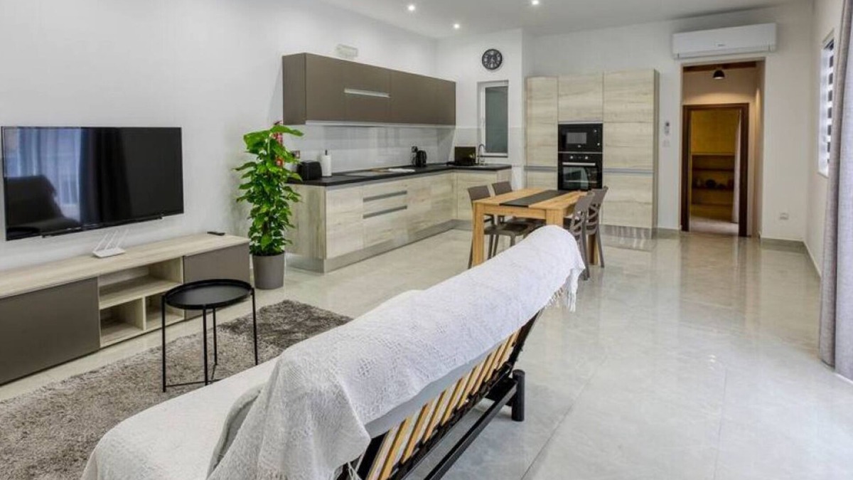 Il-Balluta Apartment | A lovely 1BR home with Balcony off the coast.