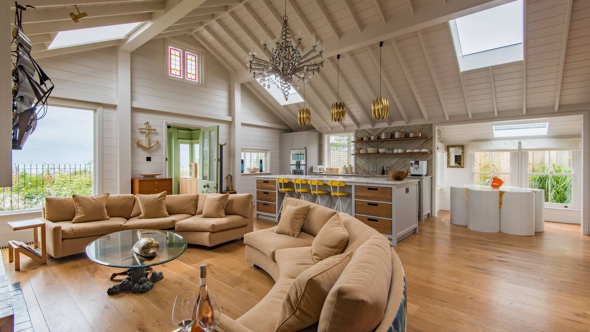 Deal House | A luxurious waters-edge holiday home by the sea sleeping 11 right on the beach