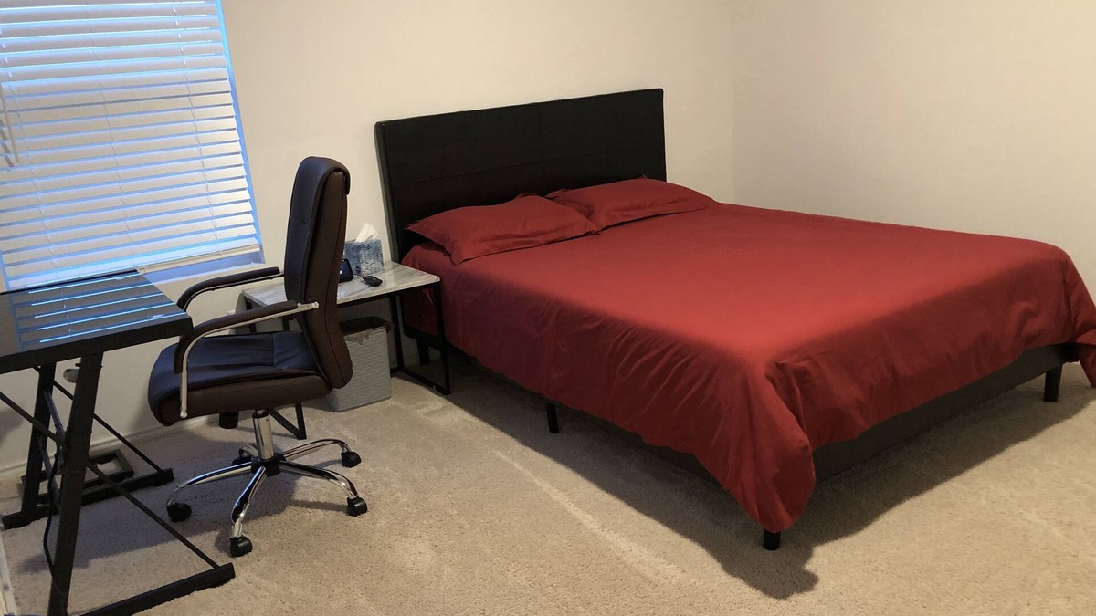 Princeton Condo | A master bedroom suite with its own bathroom and kitchen