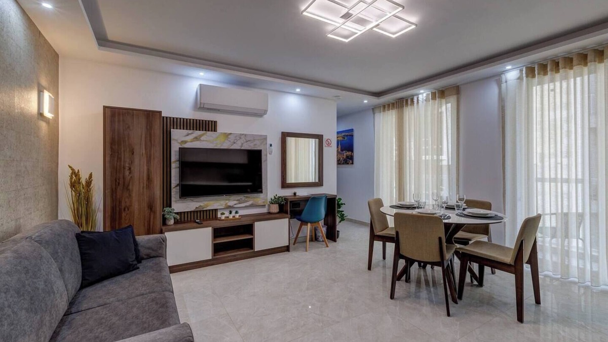 Bugibba Apartment | A modern apartment block in the heart of Bugibba. All one-bedroom flats, stylishly finished and fully equipped with comfort, ideally located close to shops, services, and all amenities.