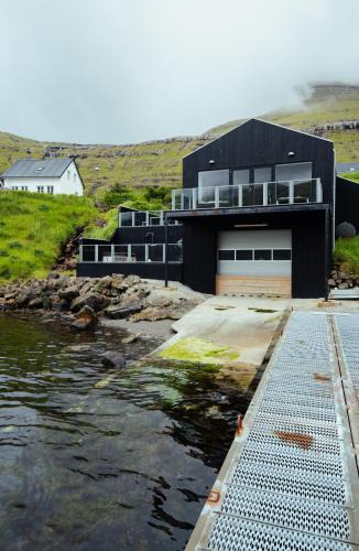 Faroe Islands Villa | A pearl in a forgotten fjord - Luxury Boathouse