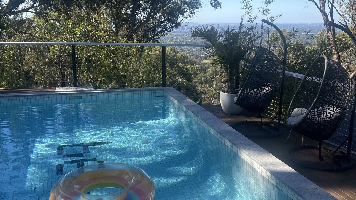 Belair Apartment | A place to relax in peace. Spa, fire pit, city lights and a pool.