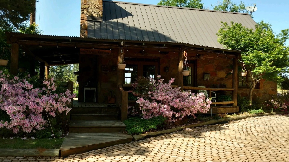 Palestine Cottage | A rustic stone cottage on an estate close to the Texas State Railroad.