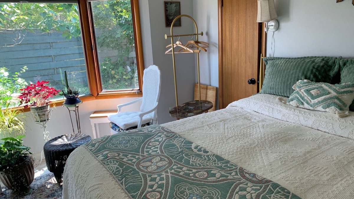 The Dalles Apartment | A shady retreat within a flower garden, with a boutique hotel feel. Close in