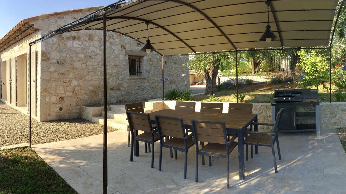 Les Maillans House | A stone farmhouse in the countryside surrounded by olive trees