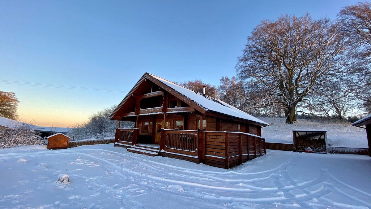 Gorebridge Cabin | A traditional Scandinavian style lodge, with stylish wooden interior decorated with a Scottish theme