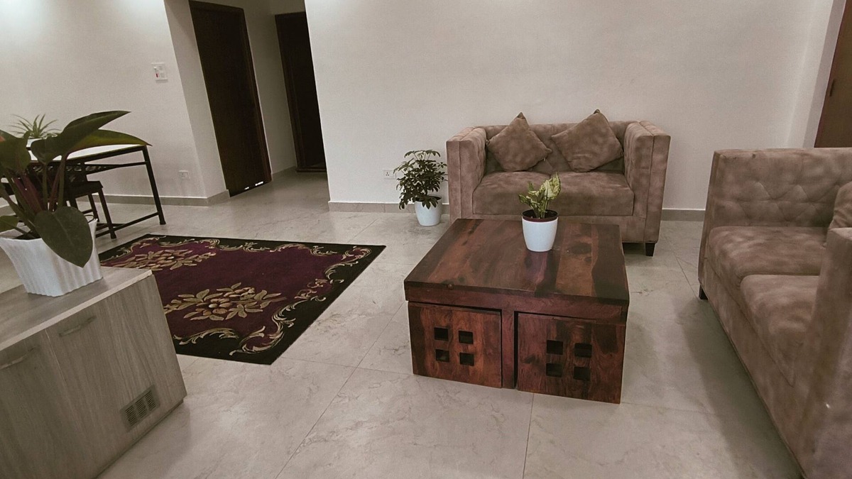 Bharatpur House | A two-bedroom home with a living room, kitchen, and garden feels like home.n