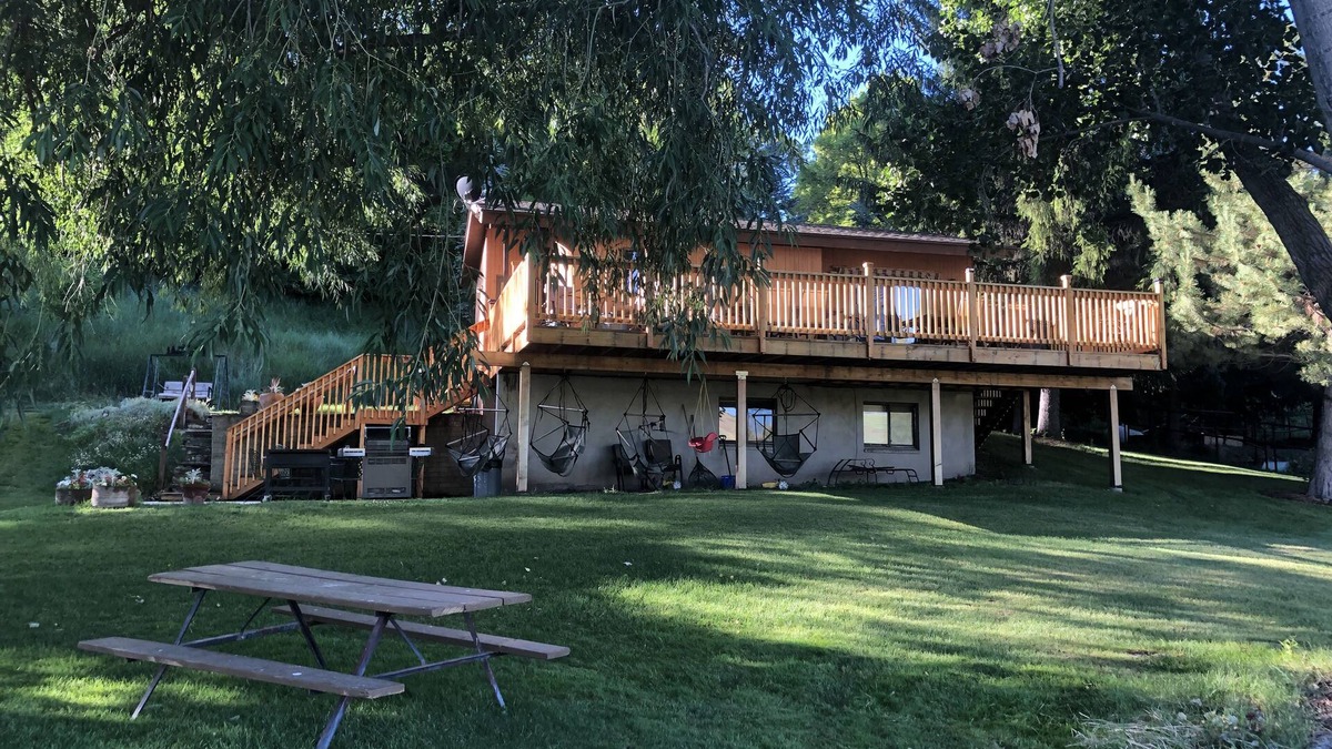 Hyrum Cabin | A wonderful, secluded 2 story cabin, deck, fire pit, stocked pond for fishing.