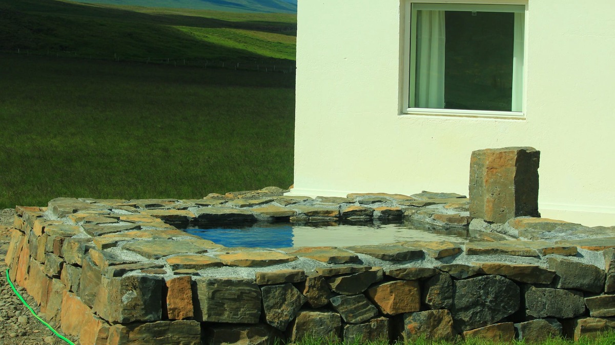 Varmahlid House | A wonderful small and cosy house with a private natural hot tub, fantastic views