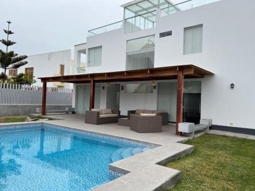 San Antonio House | Acogedora casa de playa para la familia y amigos