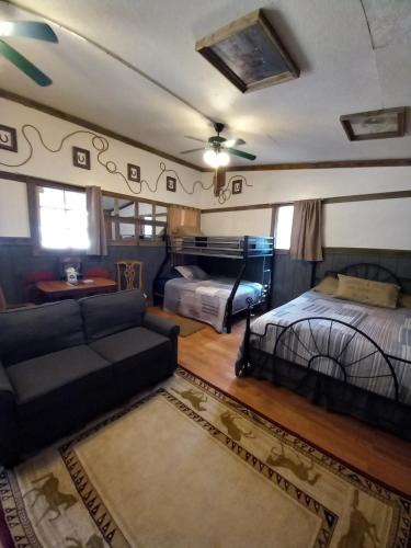 Canton House | Acorn Hideaways Canton Old West Bunkhouse for 9 - Trail's End Corral