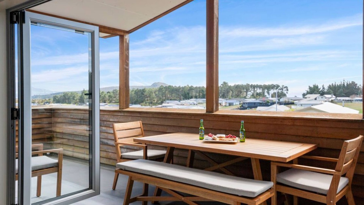 Motuoapa House | Adventure Sika - Relax on the deck with views