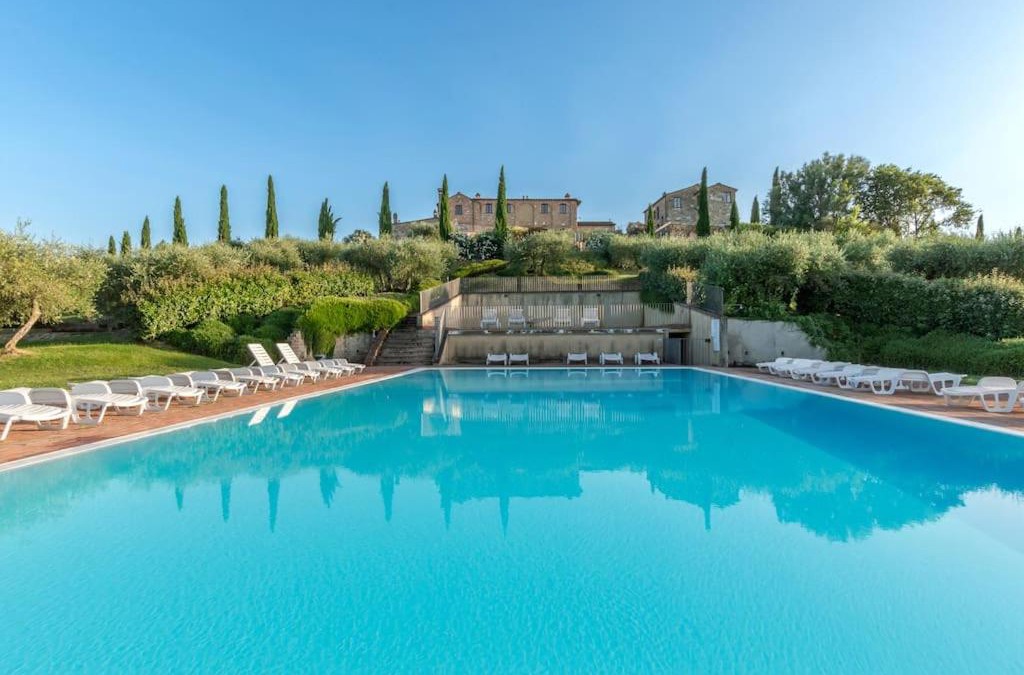 Asciano Apartment | AffittiBreviSiena - Palazzo Monaci Appartamento con piscina nelle crete Senesi