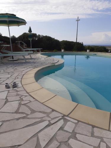 Aglientu Apartment | agriturismo gli olivastri appartamento corbezzolo con piscina e vista mare,climatizzatore,wifi