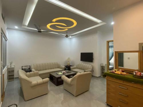 Fatehjang Apartment | Airport Layover Family Lodge