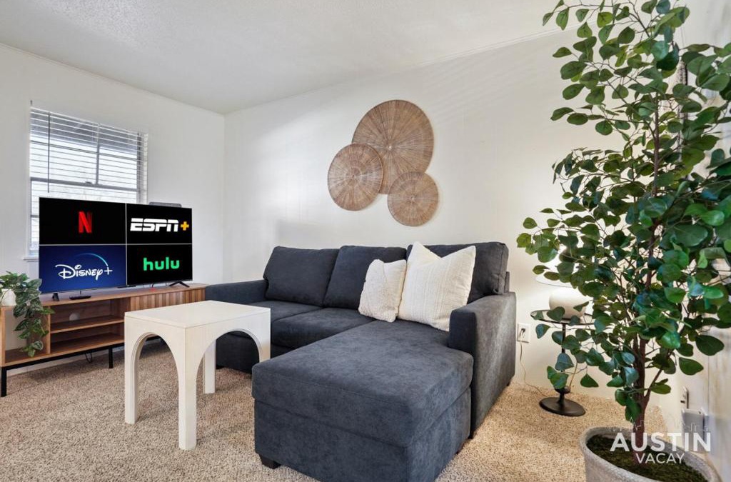 Hancock Apartment | Airy King Bedroom and Comfortable Living Space by UT