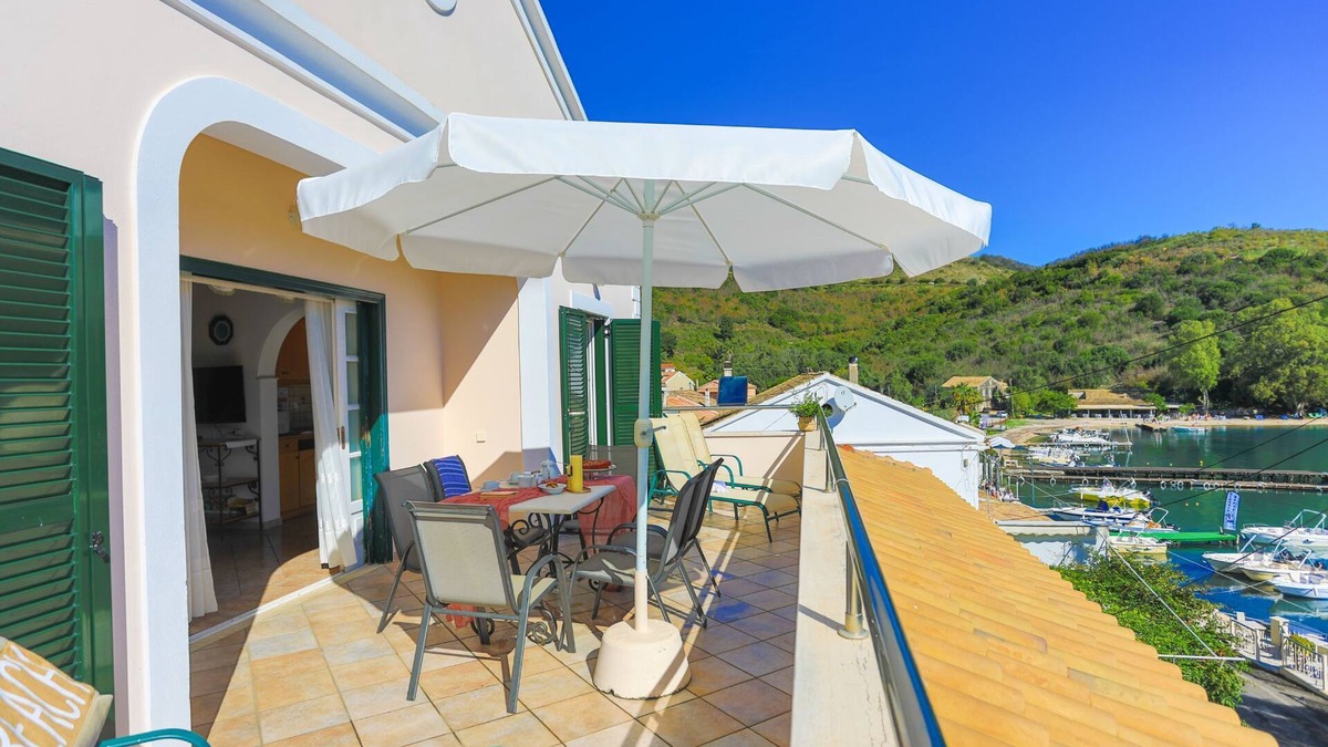 Agios Stefanos Apartment | Alexandra Bay Front: Sea Views, WiFi, A/C, Sleeps 6