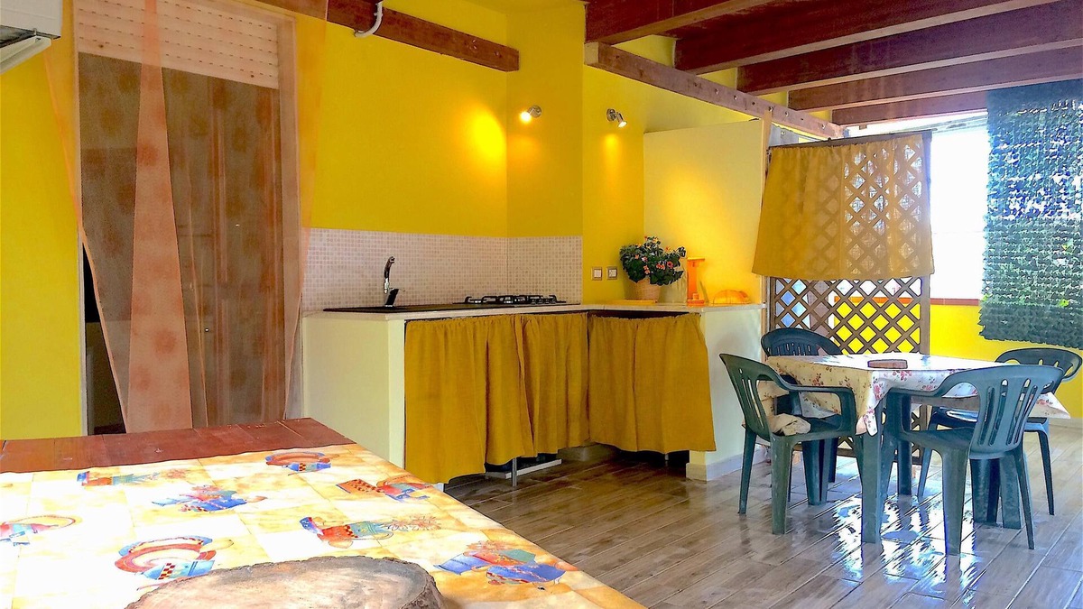 La Taulera Apartment | Alghero, Spiagge Bianca Maria Pia, beautiful veranda with outdoor kitchen