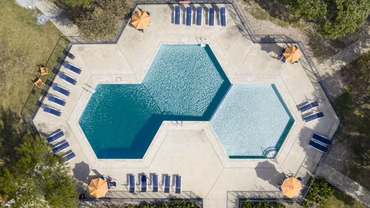 St. Johns Apartment | All Inclusive Studio that can sleep up to 4 people! Pool, Gym & Laundry onsite.