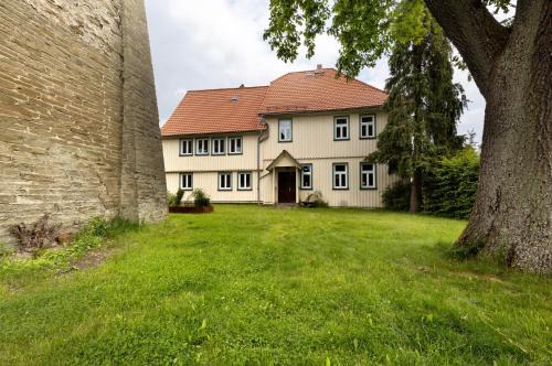 Huttenrode Apartment | Altes Pfarrhaus - Wohnung Farbwelt