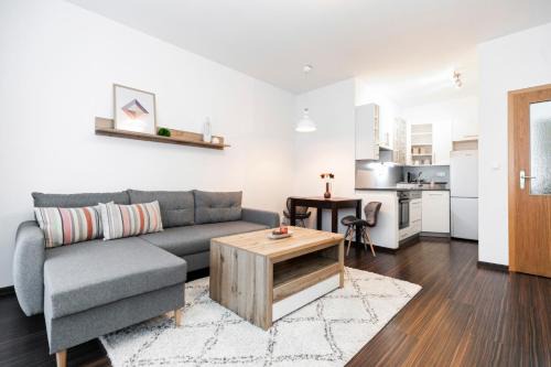 Banska Bystrica Apartment | ALURE RESIDENCES 3 & 24h self check-in, parking in the garage in the apartment building included, new building, terrace, green location with a forest park with a lake, children's playground