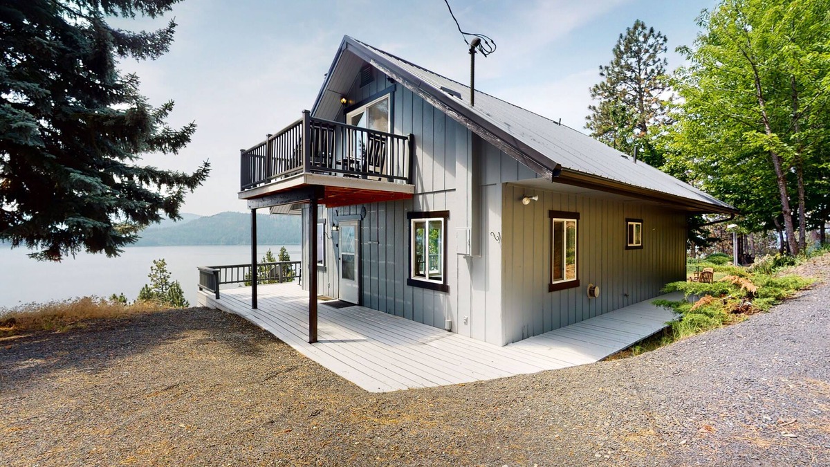 Harrison House | Amazing lake-view cabin with balcony, firepit, grill, wood stove, & W/D
