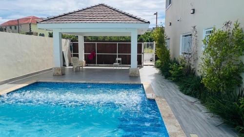 Residencial ROMANA Apartment | Ambar Luxurious Condo At Caleta