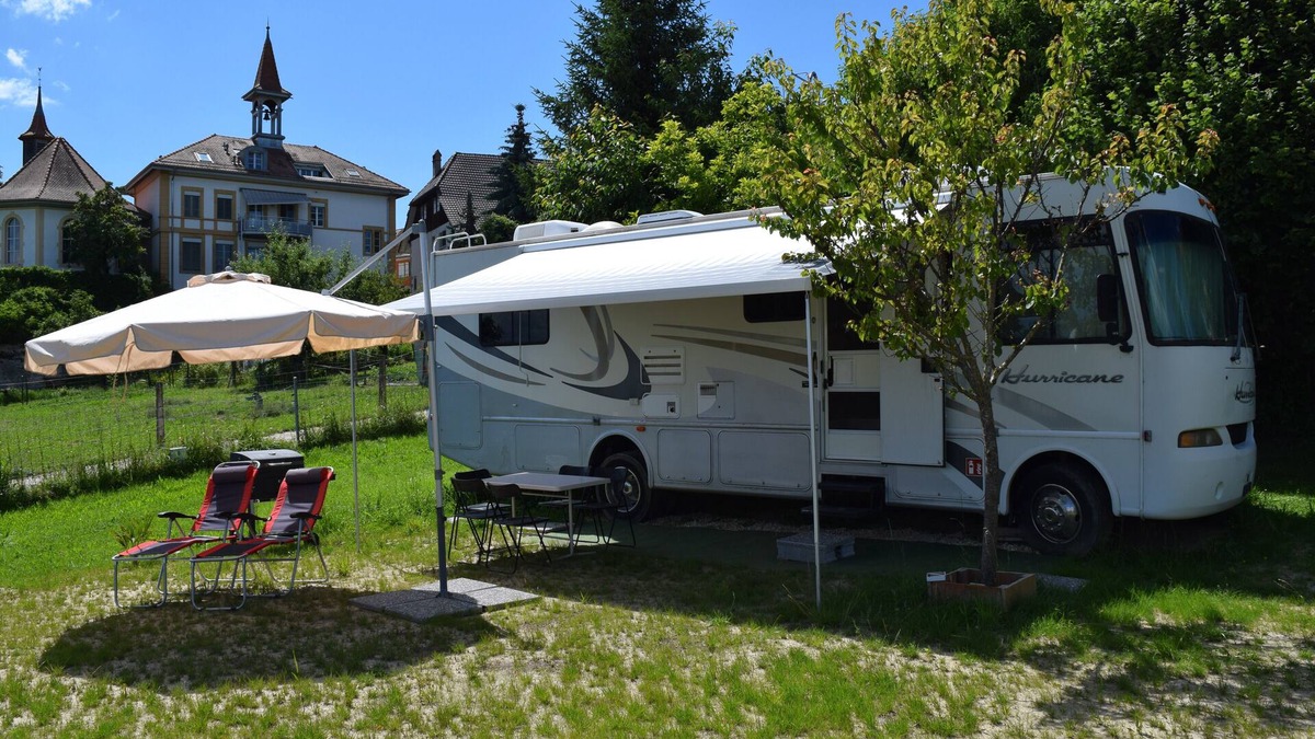 Villars-le-Grand House | American Ford Hurricane motorhome, with slide.
