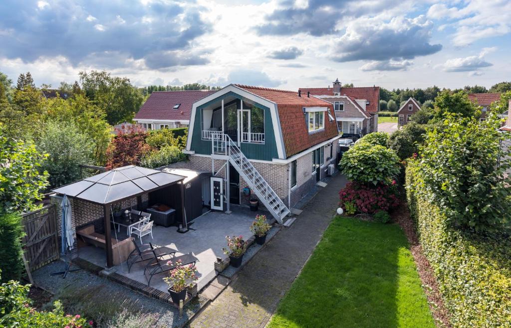 Den Ilp Apartment | Amsterdam Countryside met Airco ,Geweldig uitzicht, luxe keuken,wasmachine,droger,gratis fietsen