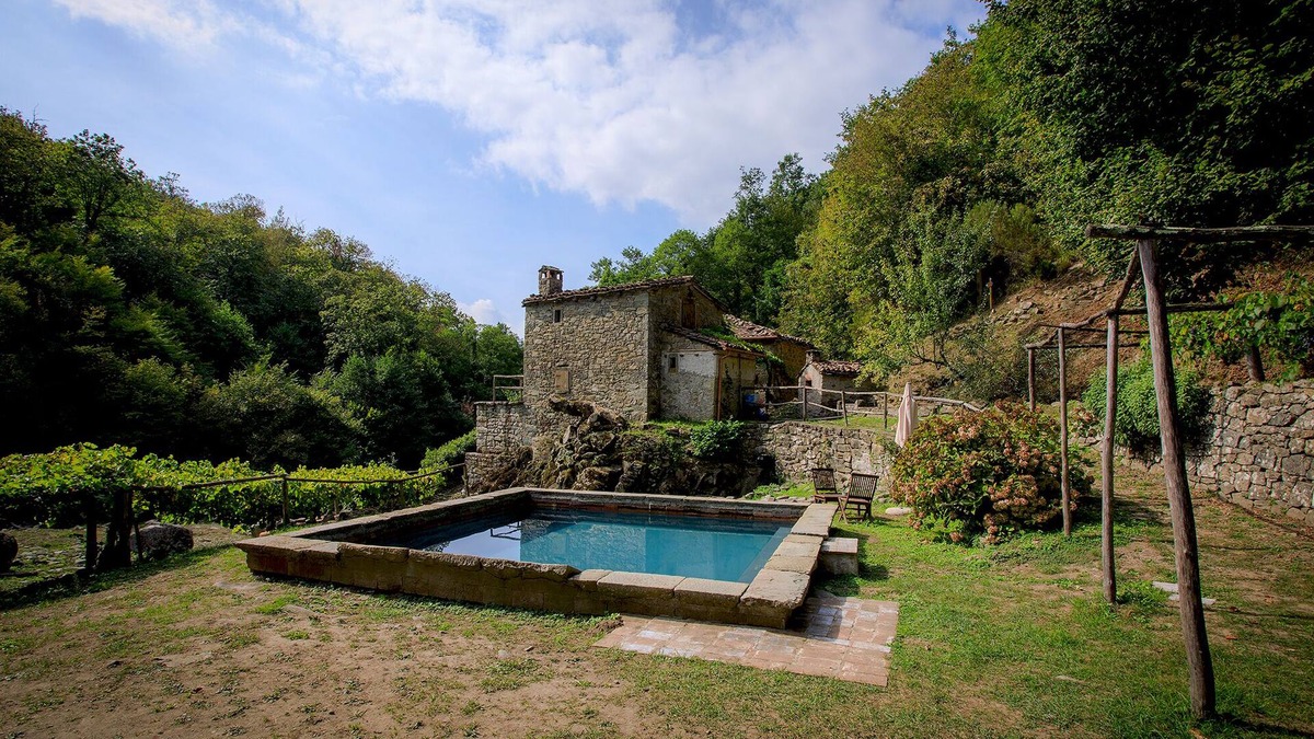 Pieve Fosciana House | Ancient mill in the "green hearth" of Tuscany