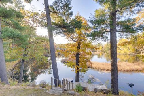 Waupaca House | Antiquing and Fishing Riverfront Waupaca Home!