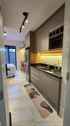 Novo Mundo Apartment | AP 102 l Com Ar condicionado l Garden l Exclusivo