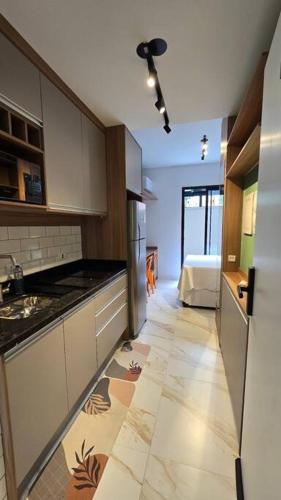 Novo Mundo Apartment | AP 103 l Com Ar condicionado l Garden l Único