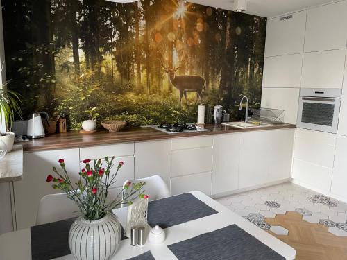 Grochow Apartment | Apartament z tarasem przy parku