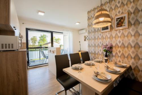Verzej Apartment | Apartmaji BANONIA " Jutranja zarja "
