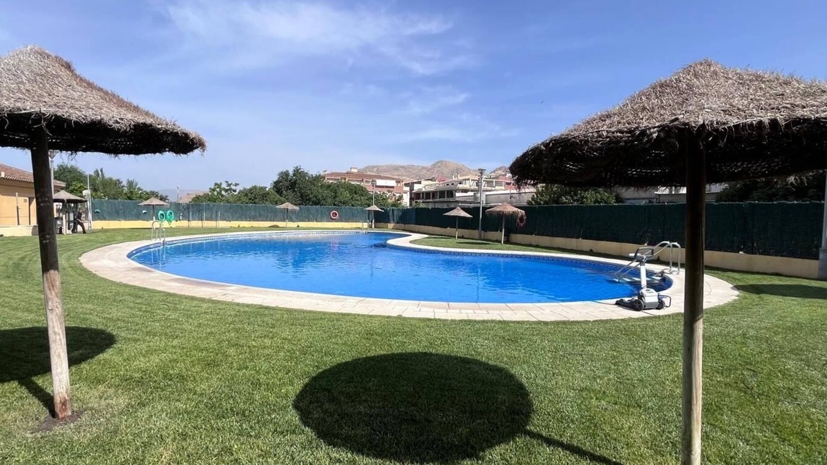 Atarfe Apartment | Apartment 'Ágora' with Mountain View, Shared Pool and Air Conditioning