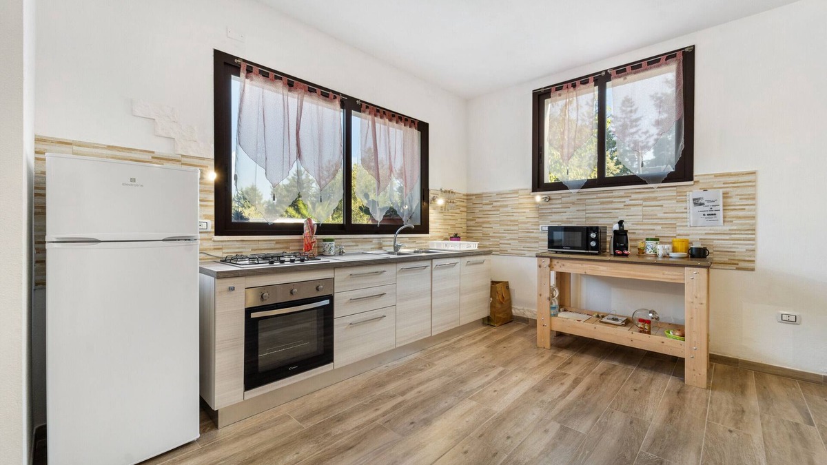 Iglesias Apartment | Apartment "Casa di Ale, Gabry e Nina" with Shared Terrace & Wi-Fi
