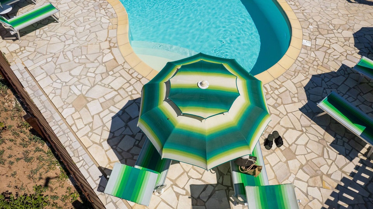 Aglientu Apartment | Apartment 'Casa Lentischio Piscina Evista Mare' with Sea View, Shared Pool and Wi-Fi
