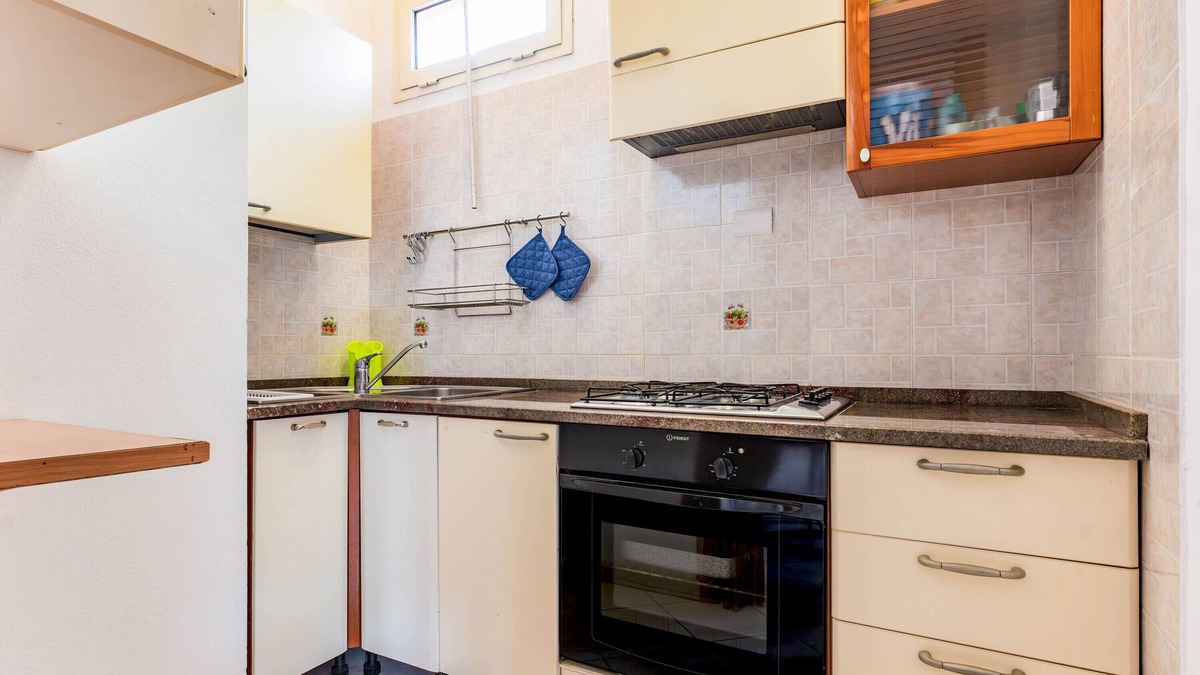 Sestu Apartment | Apartment 'Casa Rosa' with Private Garden and Air Conditioning