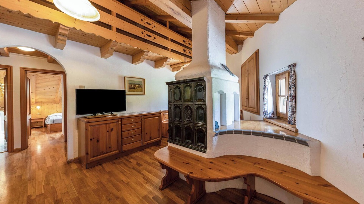 Vigo di Fassa Apartment | Apartment "Ciasa Sommavilla Mansarda" with Mountain View, Shared Garden & Wi-Fi
