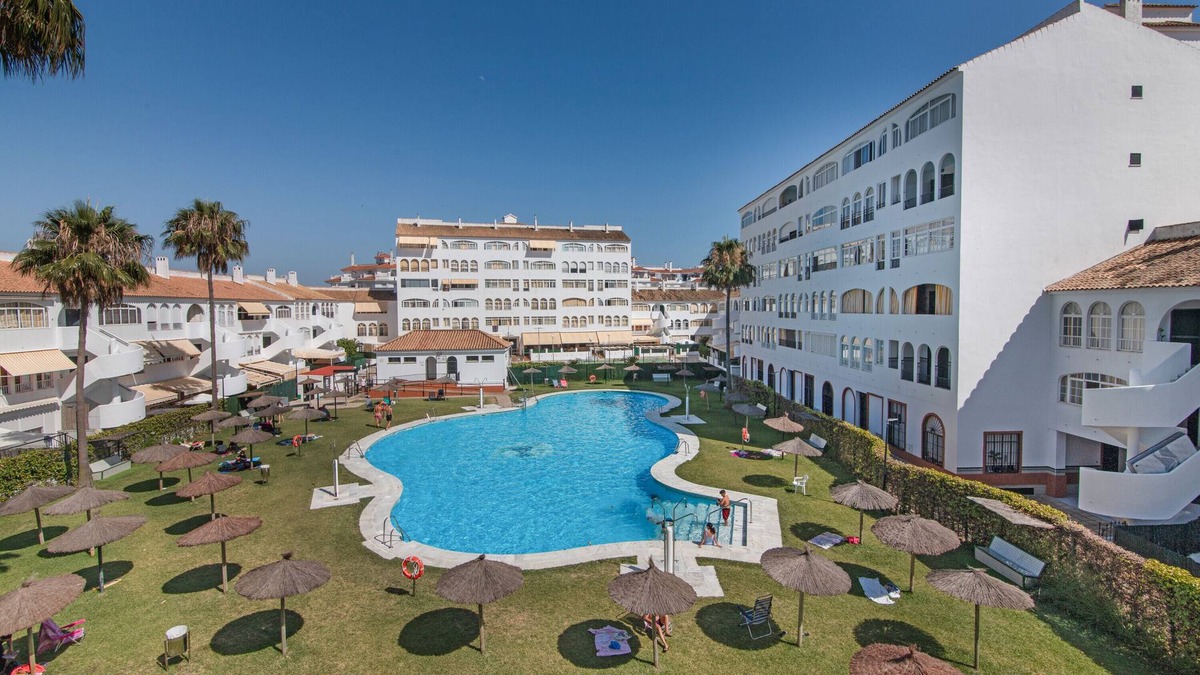 El Portil Apartment | Apartment 'El Portil' with Shared Pool, Wi-Fi and Air Conditioning