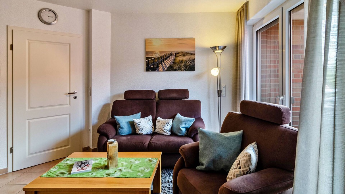 Norddeich Apartment | Apartment 'Ferienwohnung Neue Sande' with Private Garden, Balcony and Wi-Fi