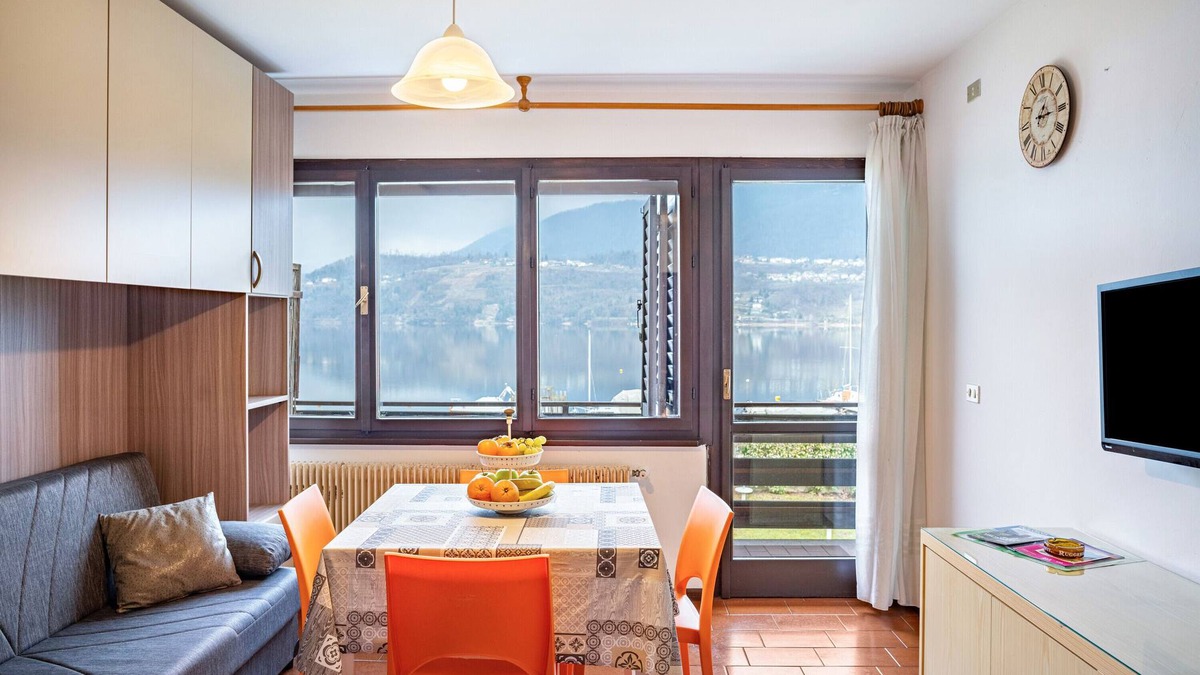 Calceranica al Lago Apartment | Apartment 'Garden Alle Barche - Marina 7' with Lake View, Shared Garden and Wi-Fi