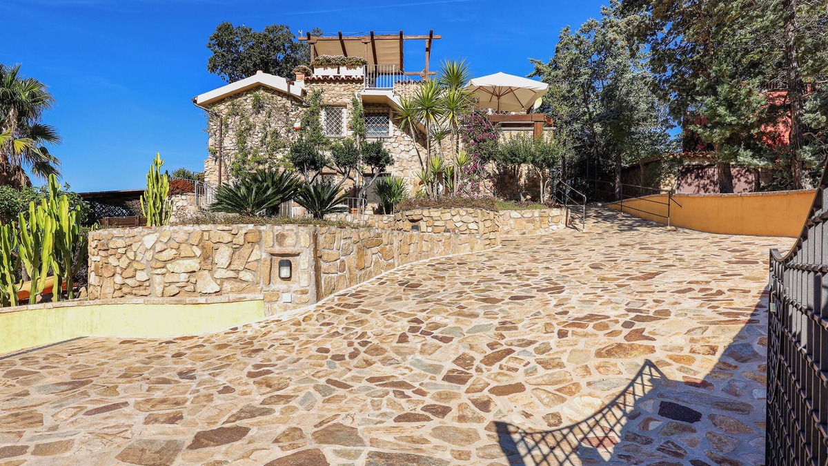 Tiriddo Apartment | Apartment Ginepri 50m from the beach, with Garden & Wi-Fi