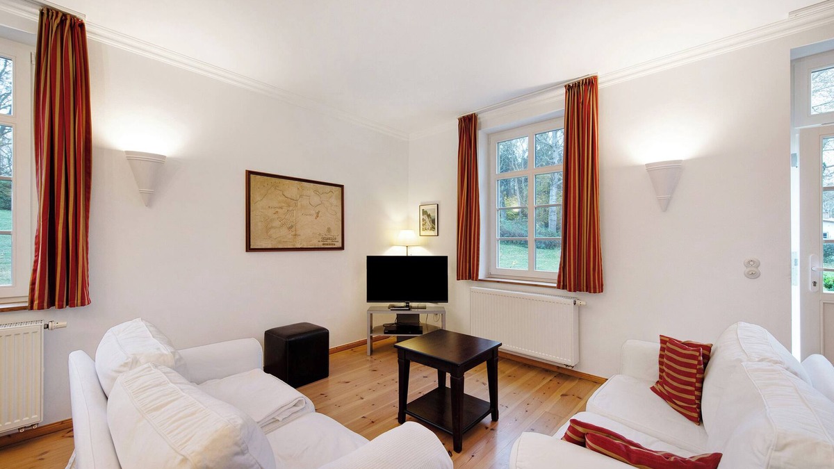 Gingst Apartment | Apartment 'Gut Rattelvitz - Parterre Ost' with Sea View, Private Terrace and Wi-Fi