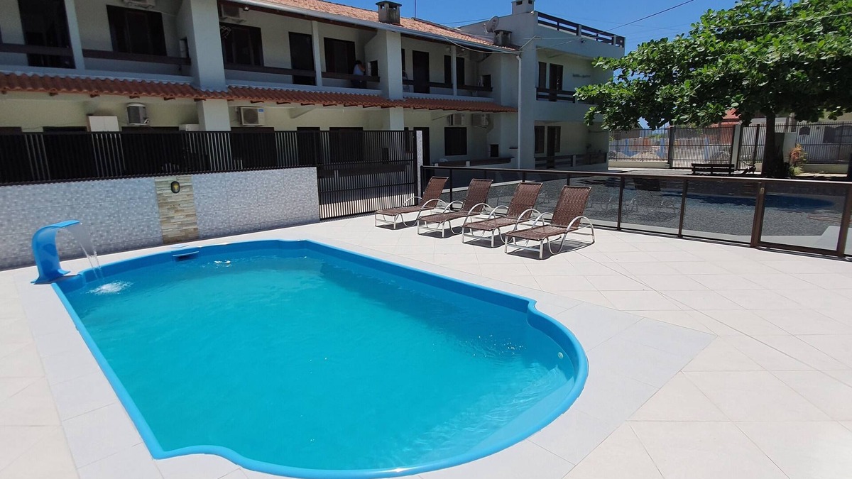 Itapoa Apartment | Apartment in gated community with pool.