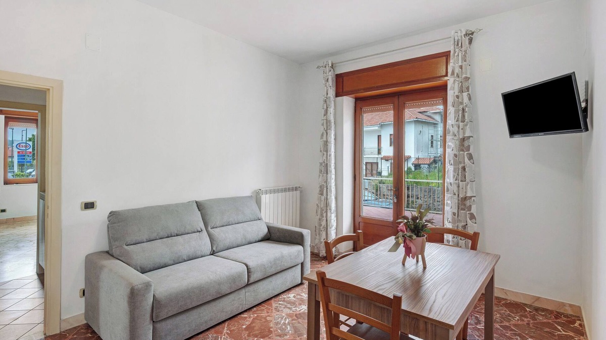 Bomerano Apartment | Apartment 'Ischia Con Terrazza' with Private Terrace, Shared Garden and Wi-Fi